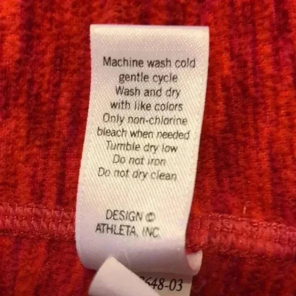 Athleta hoodie with two open pockets on front and zippered pocket on sleeve. - Picture 13 of 13